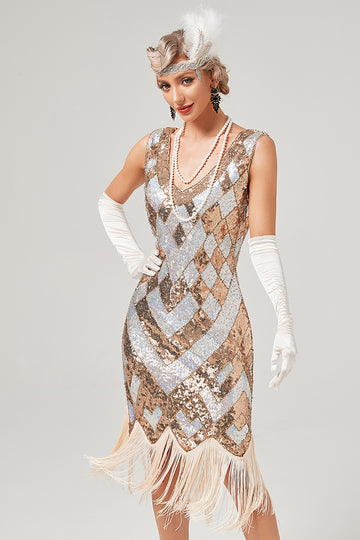 Vestido de lentejuelas doradas de la década de 1920 con flecos